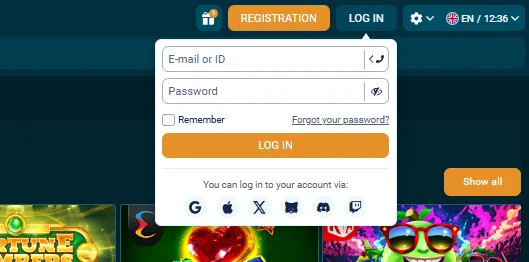 Coldbet login dropdown showing email or ID field, password field with visibility toggle, Remember checkbox, Forgot password link and social login row with Google, Apple, X, Discord, Twitch buttons